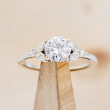 "BLOSSOM" - ROUND CUT MOISSANITE ENGAGEMENT RING WITH LEAF-SHAPED DIAMOND ACCENTS-1