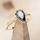 "HOPE" - PEAR-SHAPED MIDNIGHT BLACK MOISSANITE SOLITAIRE ENGAGEMENT RING WITH FEATHER ACCENTS-1